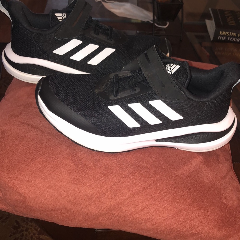 Black kids size 3 Adidas sneaker. Never worn